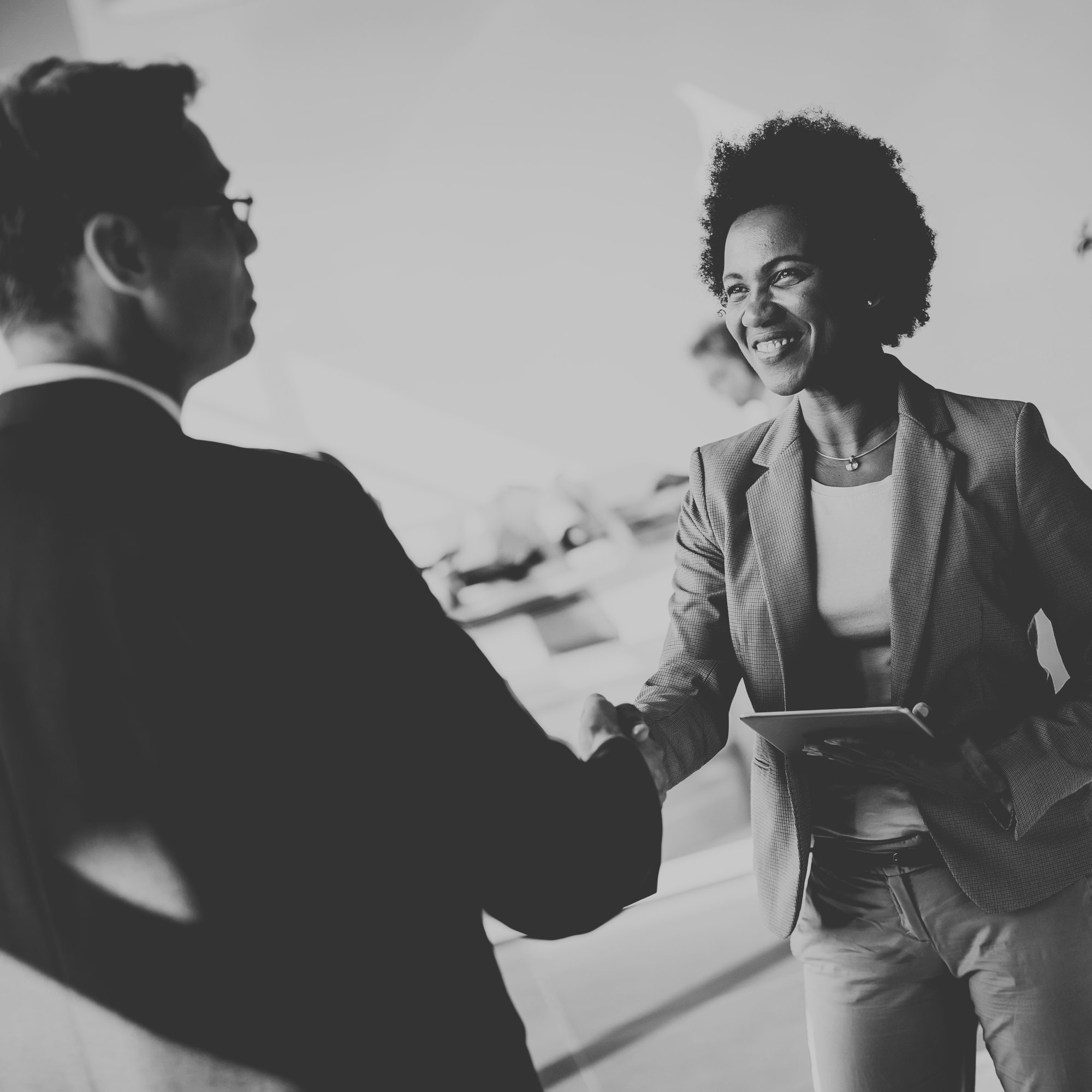 Handshake edited with newspaper